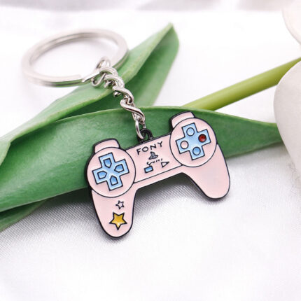 Брелок джойстик Playstation розовый на фоне
